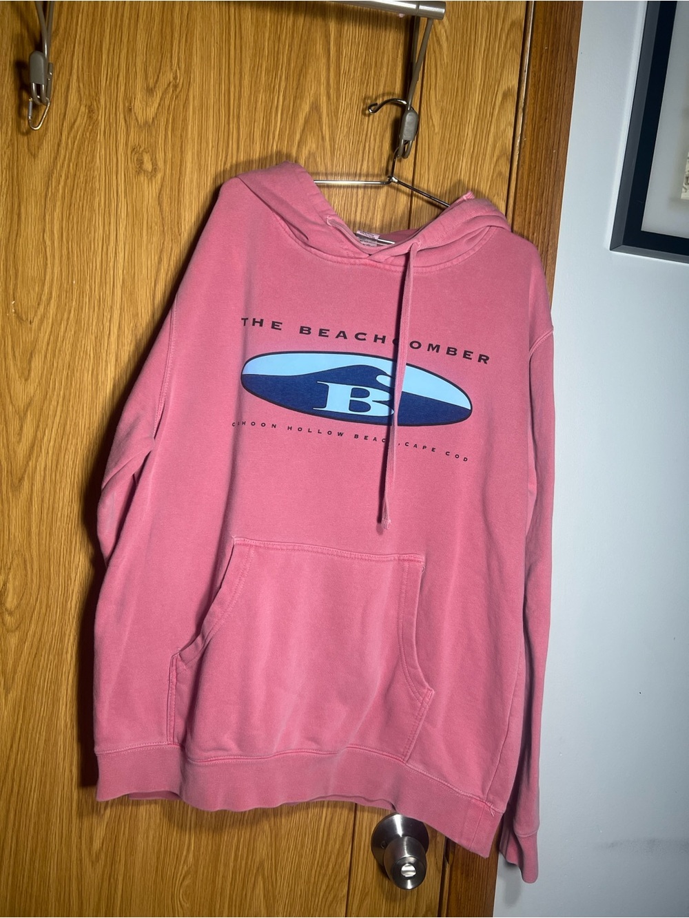The Beachcomber Pink Pullover Hoodie with Surf Logo